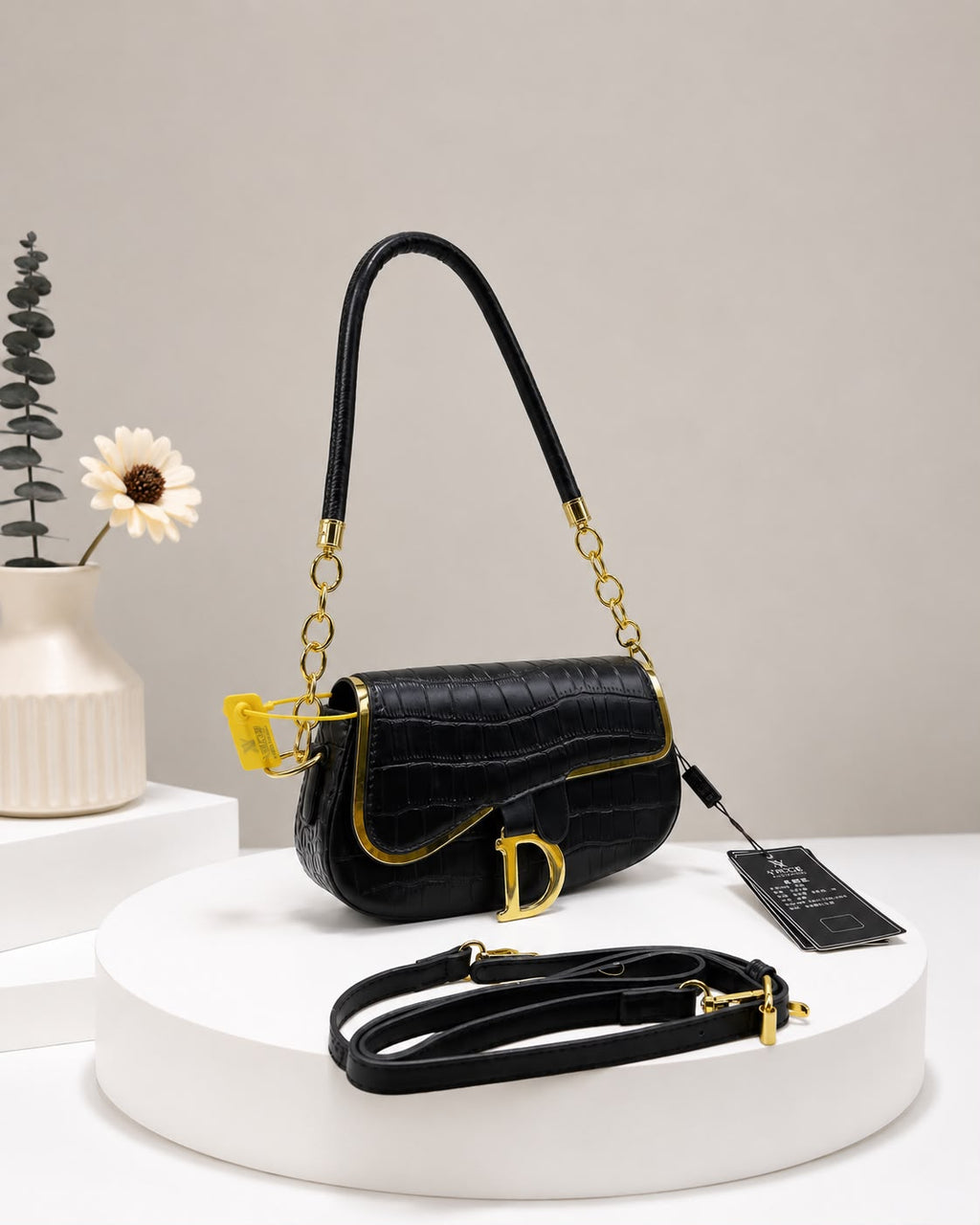 The Croc Saddle Bag. Gold Details. Total Elegance
