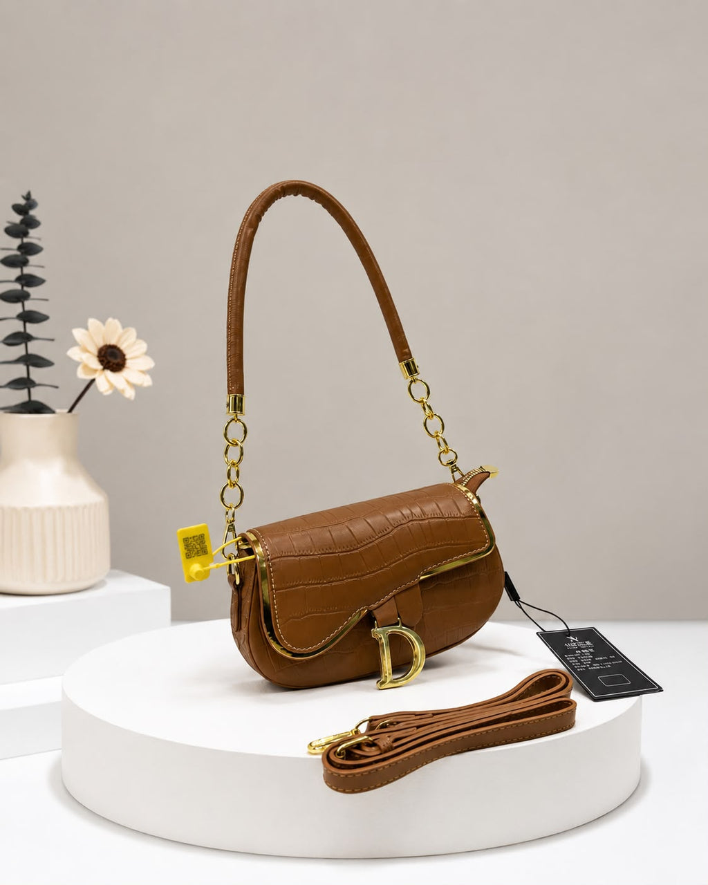 The Croc Saddle Bag. Gold Details. Total Elegance