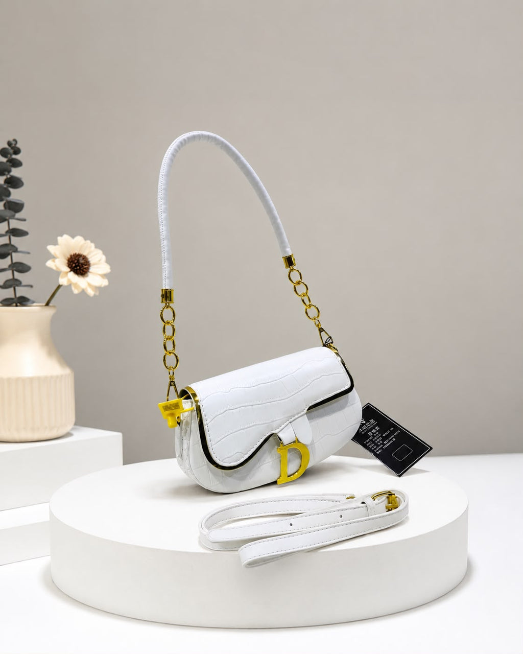 The Croc Saddle Bag. Gold Details. Total Elegance